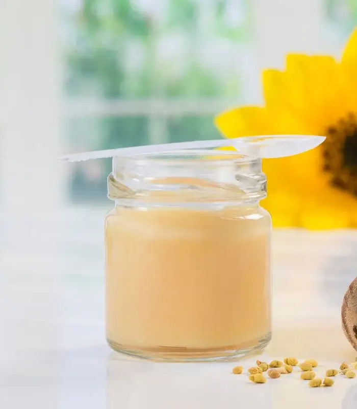 Royal Jelly by Shah Farms Pakistan - fresh royal jelly in a glass jar with bee pollen